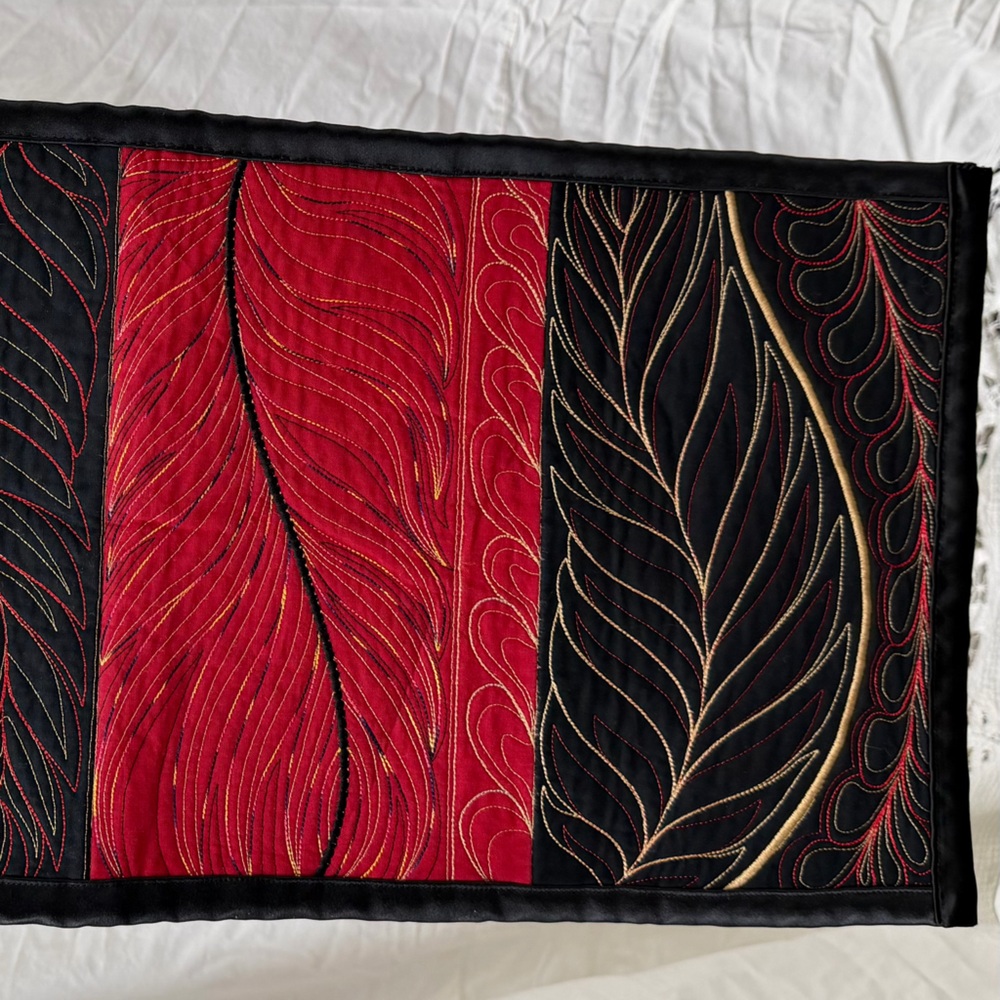 Elegant Red and Black Quilted Table Runner